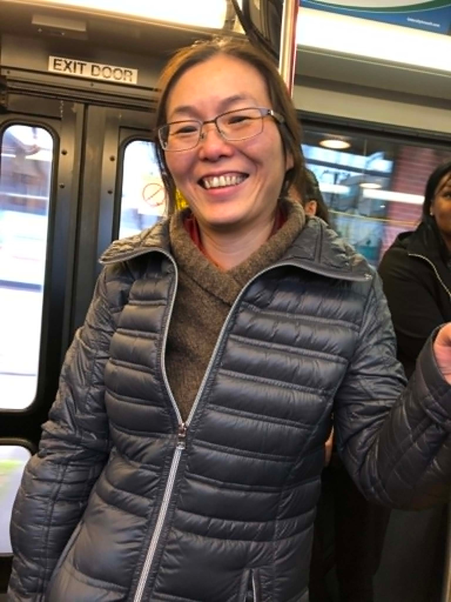 An Academy participant smiling during a site visit