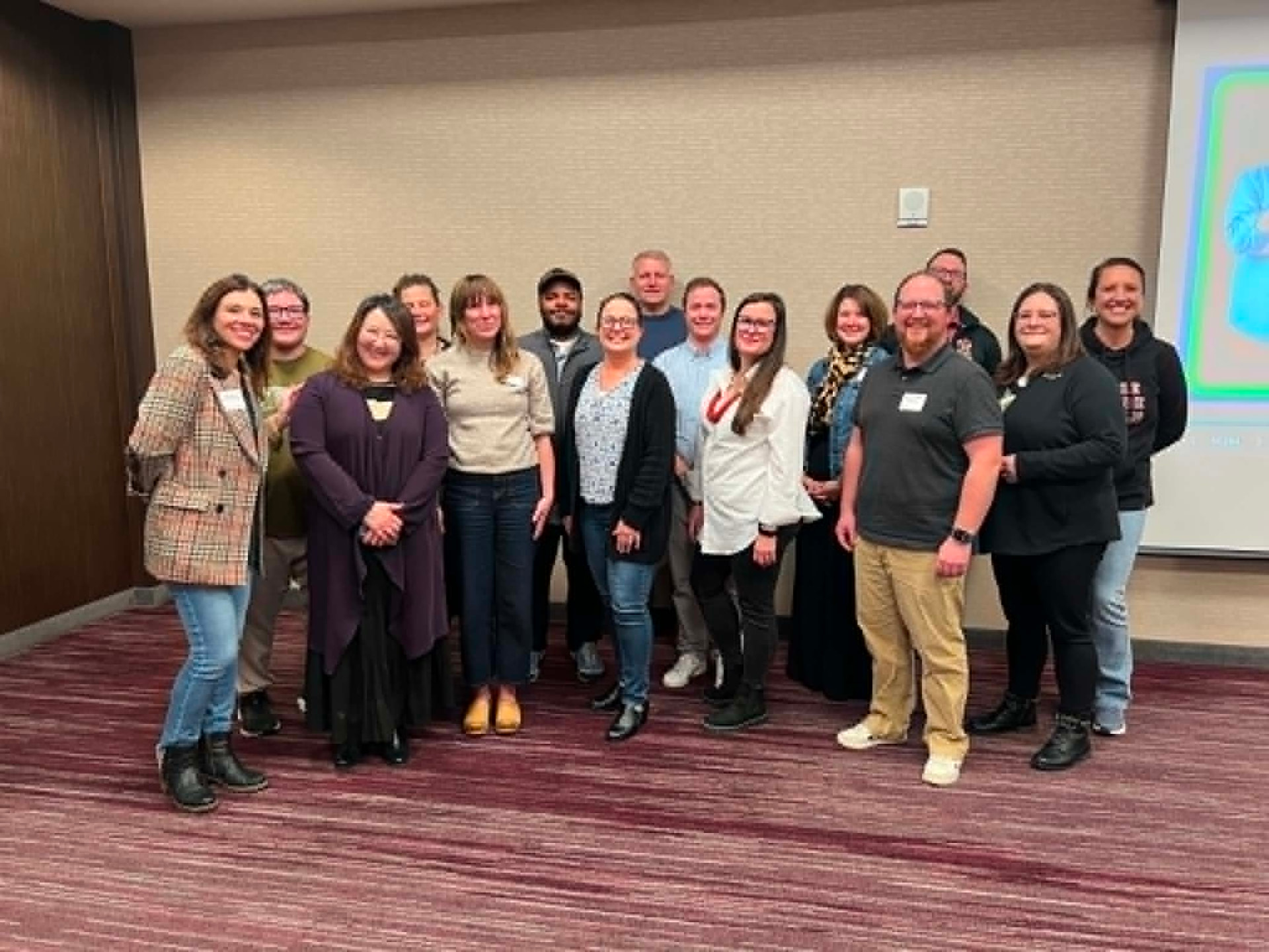 A Workforce Deans Academy cohort gathered together during an in-person session