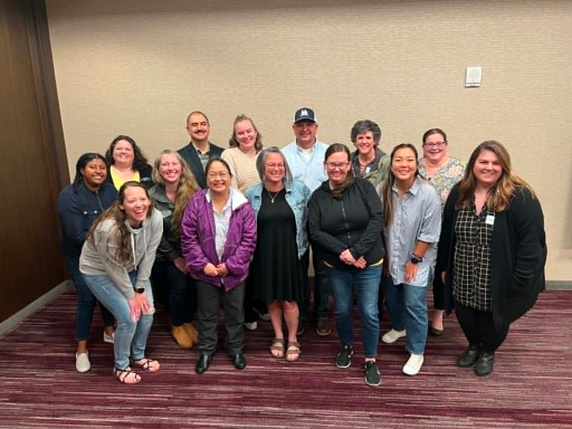 Academy participants posed together for a cohort portrait