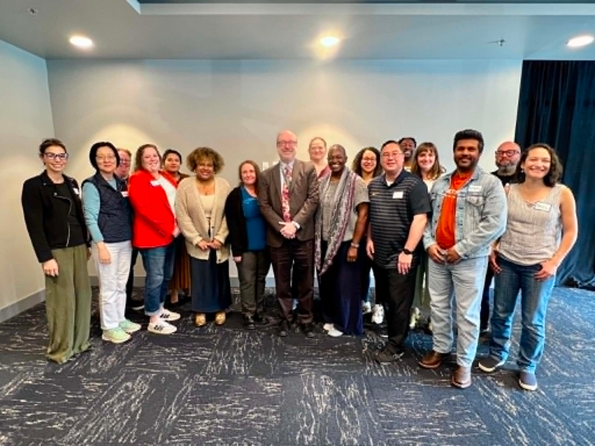 Academy cohort gathered together for a group photo during an in-person session
