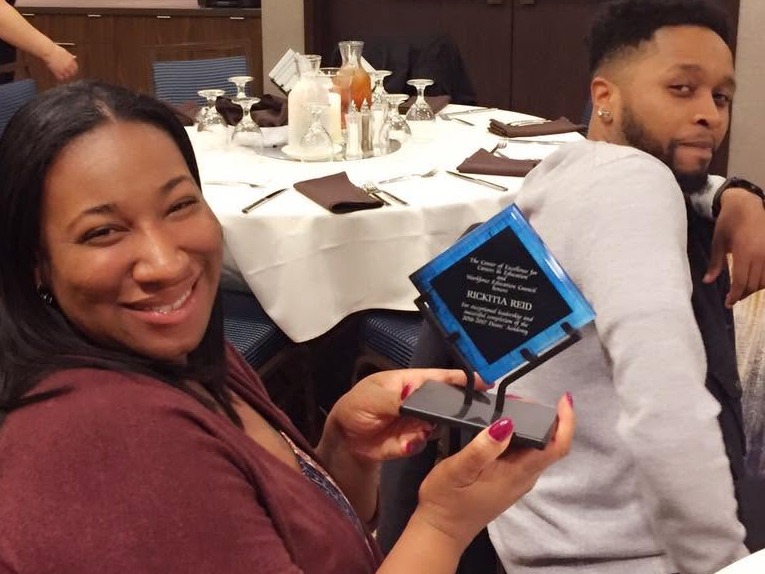 An Academy participant being recognized with an award