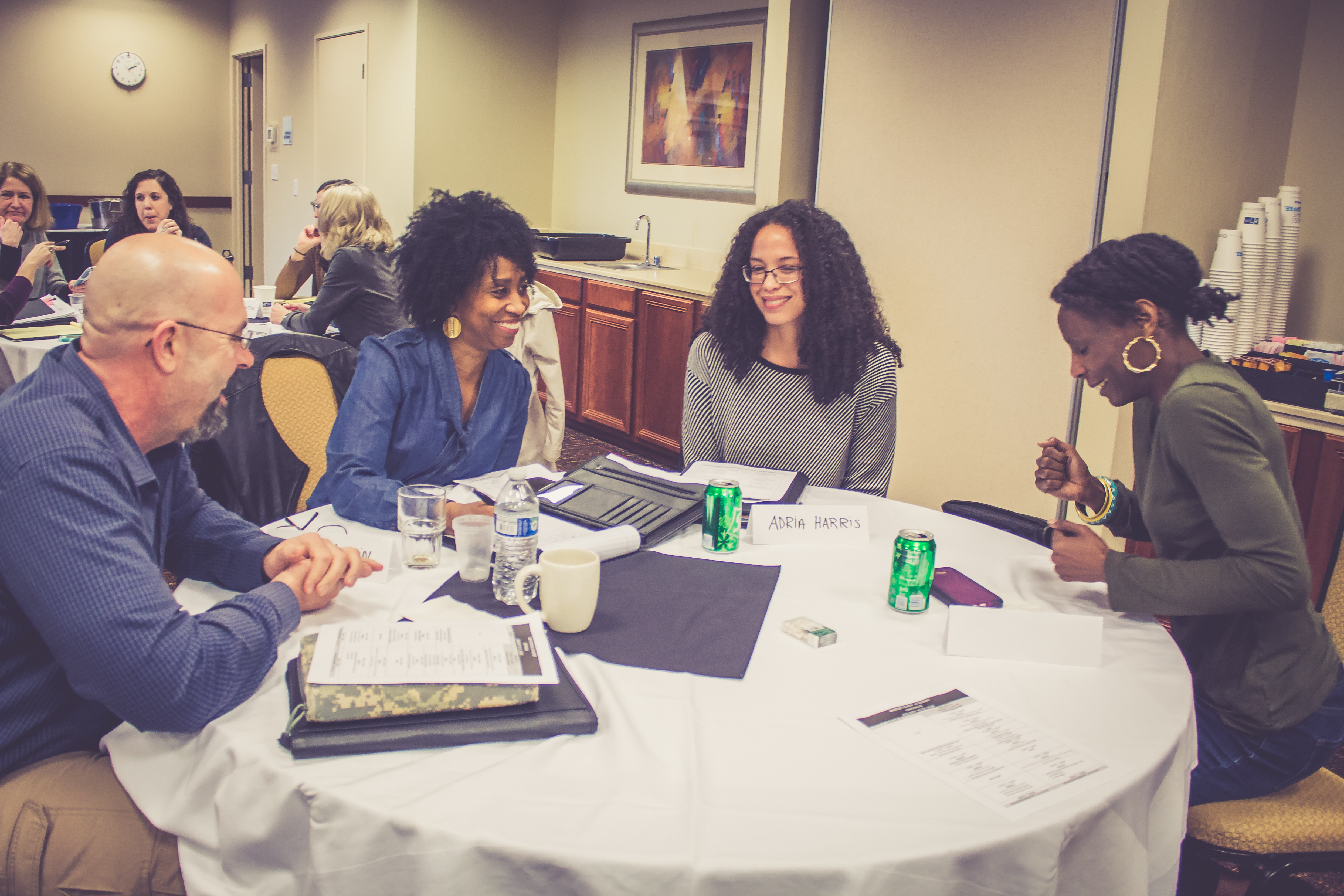 Participants engage at table